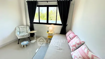 Cozy living room with stylish decor and natural light