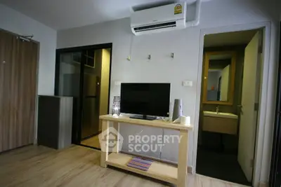 Modern living room with air conditioning and TV in stylish apartment