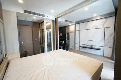 Modern bedroom with sleek design and integrated storage solutions