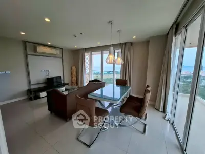 Spacious living room with modern furniture and stunning city view