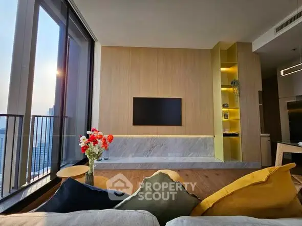 Modern living room with large windows and stylish decor