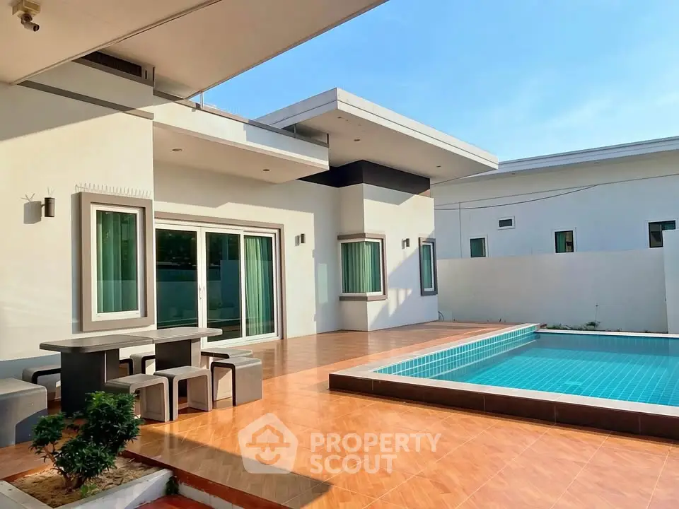 Modern villa with private pool and spacious patio, perfect for luxury outdoor living.