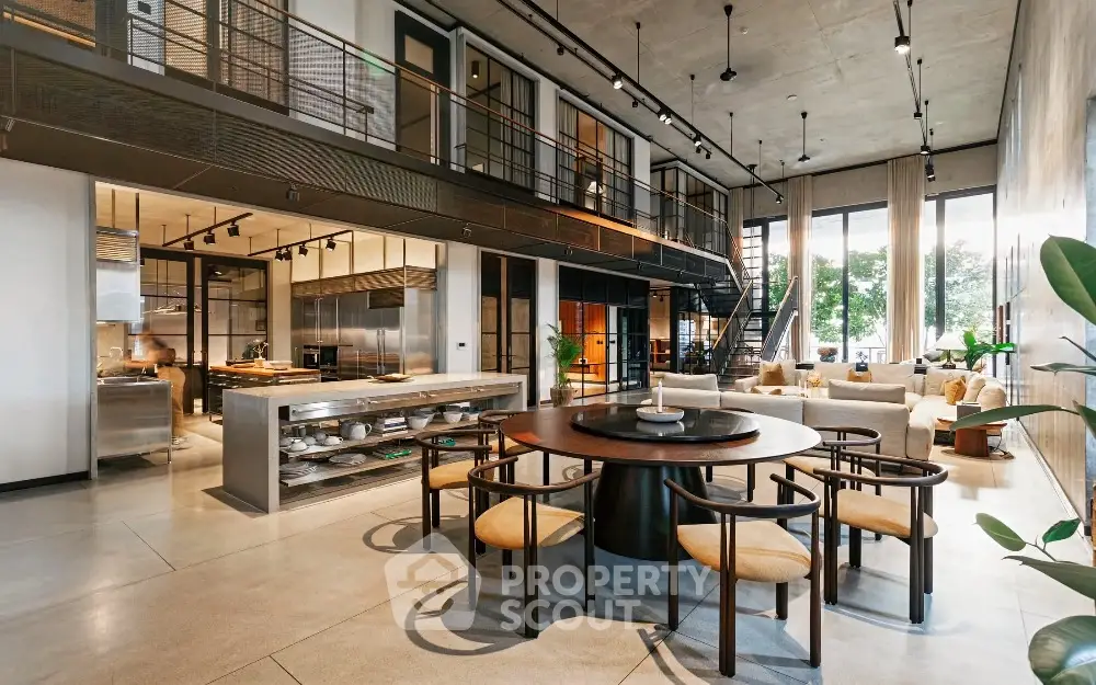 Luxurious open-plan living room with modern industrial design and high ceilings