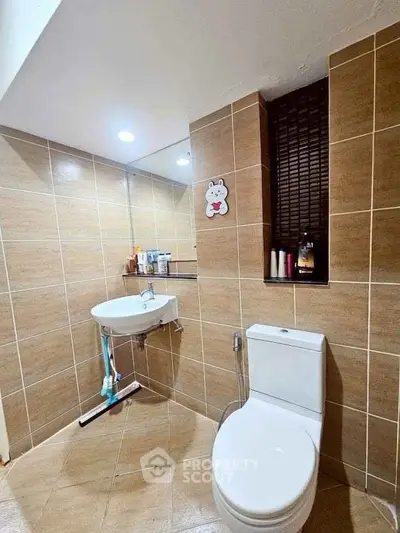 Modern bathroom with sleek fixtures and stylish tile design