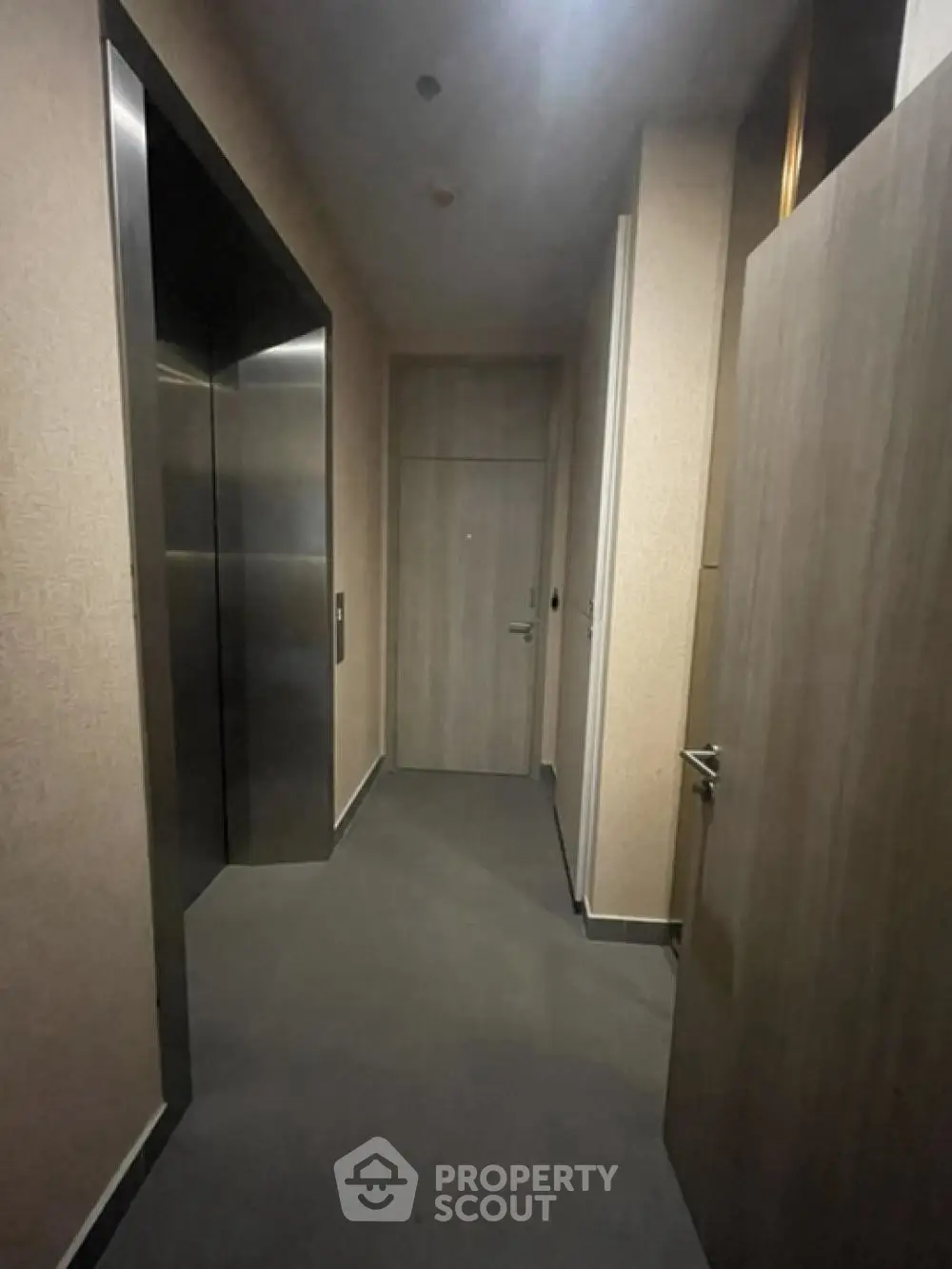 Modern elevator hallway with sleek design and neutral tones