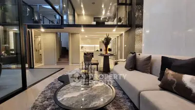 Luxurious modern living room with mezzanine and elegant decor