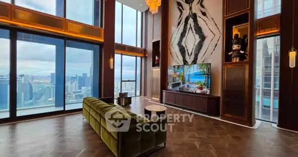 Luxurious high-rise living room with stunning city views and elegant decor.