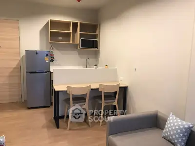 Modern compact kitchen with dining area and cozy living space