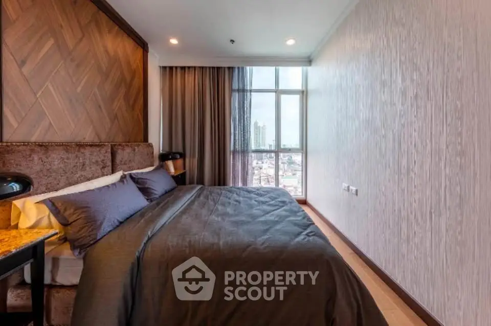 Luxurious bedroom with city view and elegant decor in modern apartment