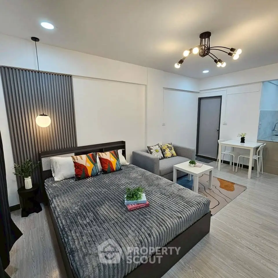 Modern studio apartment with stylish decor and cozy furnishings