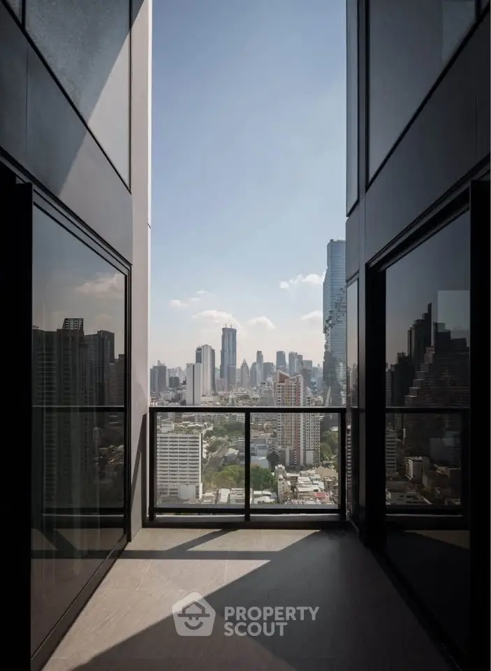 Stunning cityscape view from a modern high-rise balcony, perfect for urban living enthusiasts.