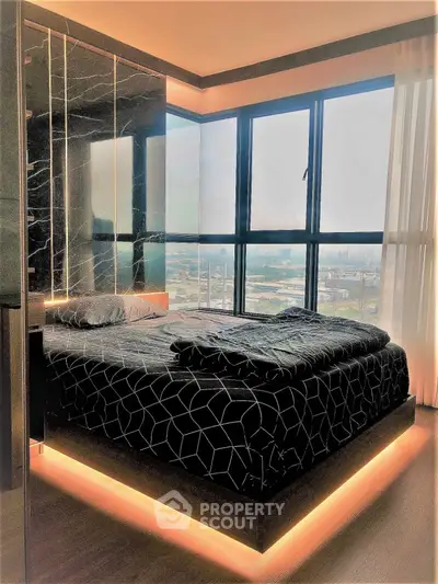 Modern bedroom with panoramic city view and stylish lighting