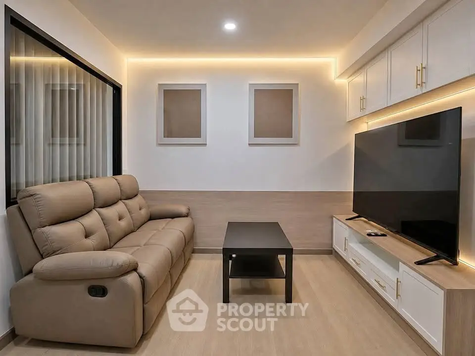 Modern living room with sleek furniture and ambient lighting