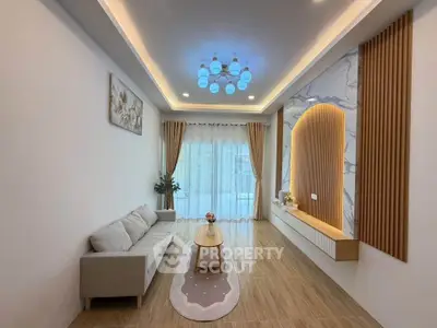 Elegant modern living room with stylish lighting and cozy decor