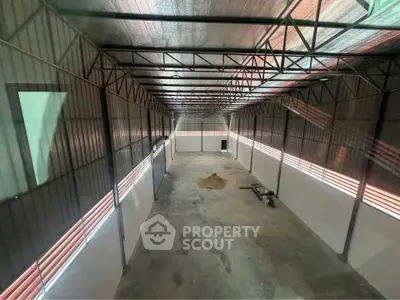 Spacious industrial warehouse with high ceilings and ample storage space