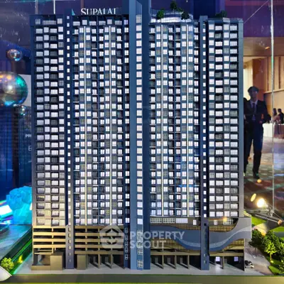 Stunning architectural model of a modern high-rise building with sleek design and urban appeal.