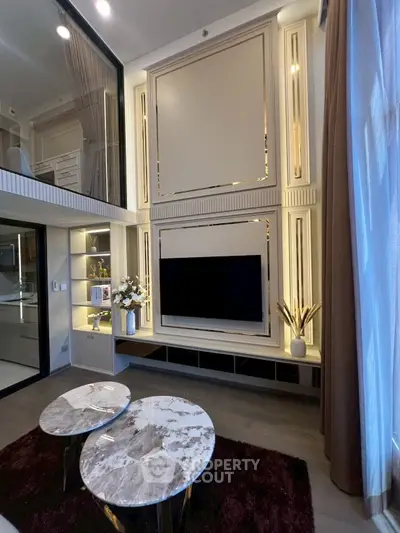 Luxurious modern living room with high ceiling and elegant decor