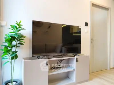 Modern living room with sleek TV stand and stylish decor