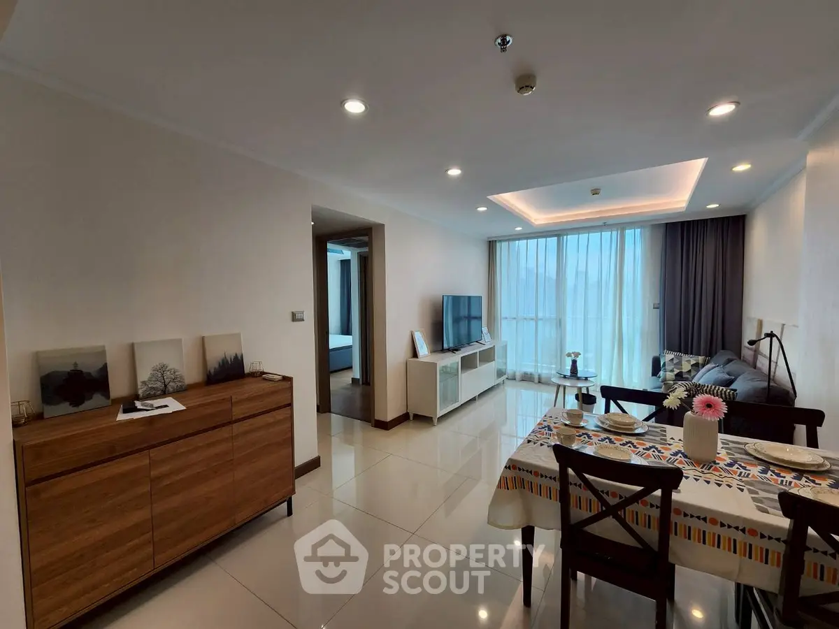 Spacious modern living room with dining area and natural light