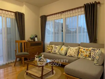Cozy living room with stylish decor and natural light