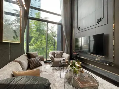 Luxurious modern living room with high ceilings and large windows offering a stunning view of greenery.