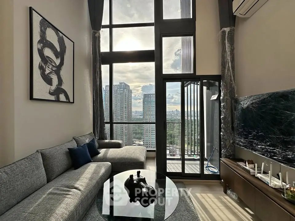 Luxurious high-rise living room with stunning city view and modern decor