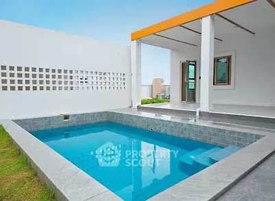 Modern villa with private pool and stylish patio, perfect for luxury living.