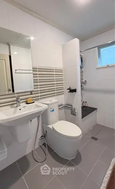 Modern bathroom with sleek fixtures and stylish tile design