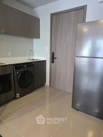 Modern kitchen with sleek appliances and stylish cabinetry