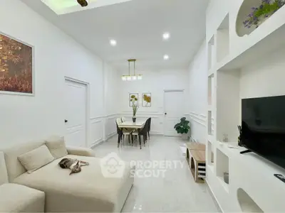 Elegant living room with modern decor and cozy seating area