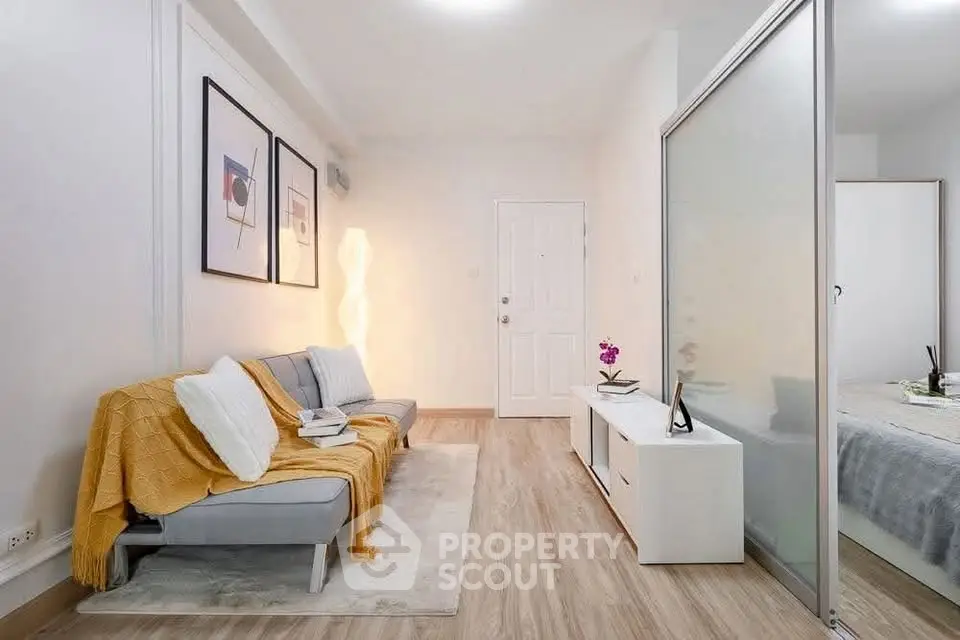 Modern living room with cozy sofa and stylish decor in bright apartment