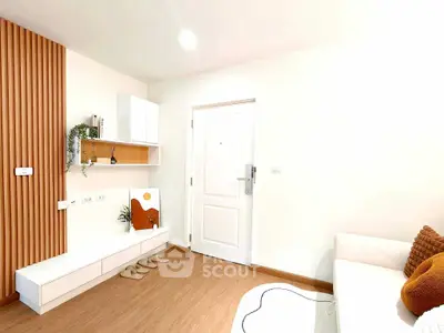 Modern living room with minimalist decor and wooden accents