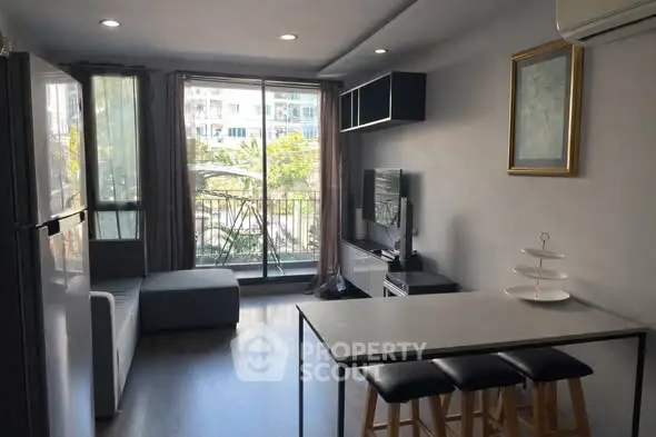 Modern living room with balcony and sleek interior design