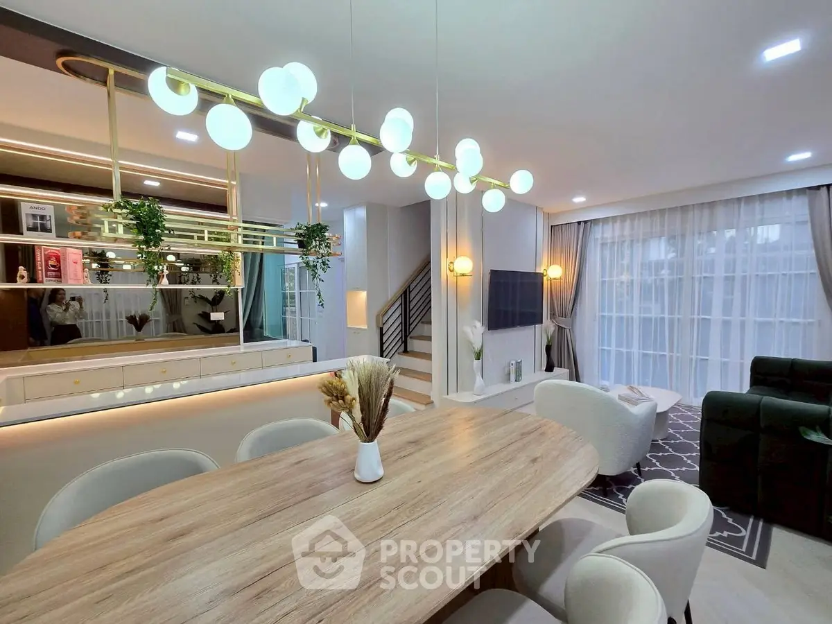 Luxurious modern living room with elegant dining area and stylish lighting