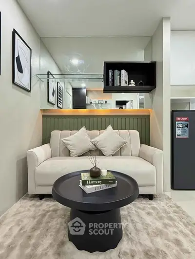 Stylish modern living room with cozy sofa and chic decor, perfect for urban living.