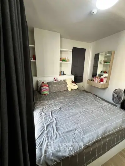 Cozy bedroom with modern decor and ample storage space