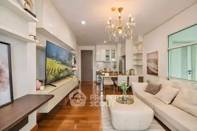 Luxurious living room with elegant chandelier and modern decor