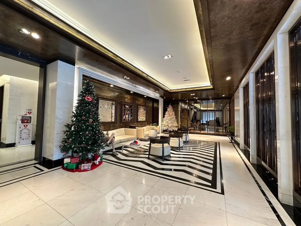Luxurious lobby with festive Christmas decor and elegant seating area