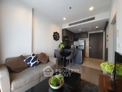 Modern living room with open kitchen in stylish apartment
