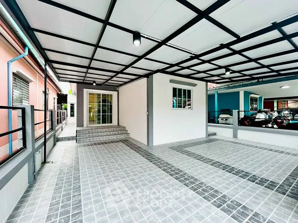 Spacious modern carport with sleek design and tiled flooring