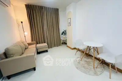 Cozy living room with modern furniture and warm lighting, perfect for relaxation and entertaining guests.