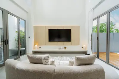 Luxurious modern living room with high ceilings and elegant decor