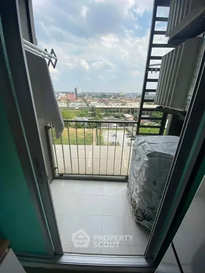 Charming balcony with city view, perfect for relaxation and enjoying the skyline.