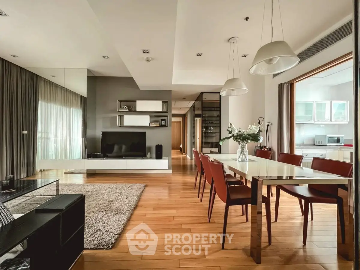 Spacious modern living and dining area with open kitchen layout