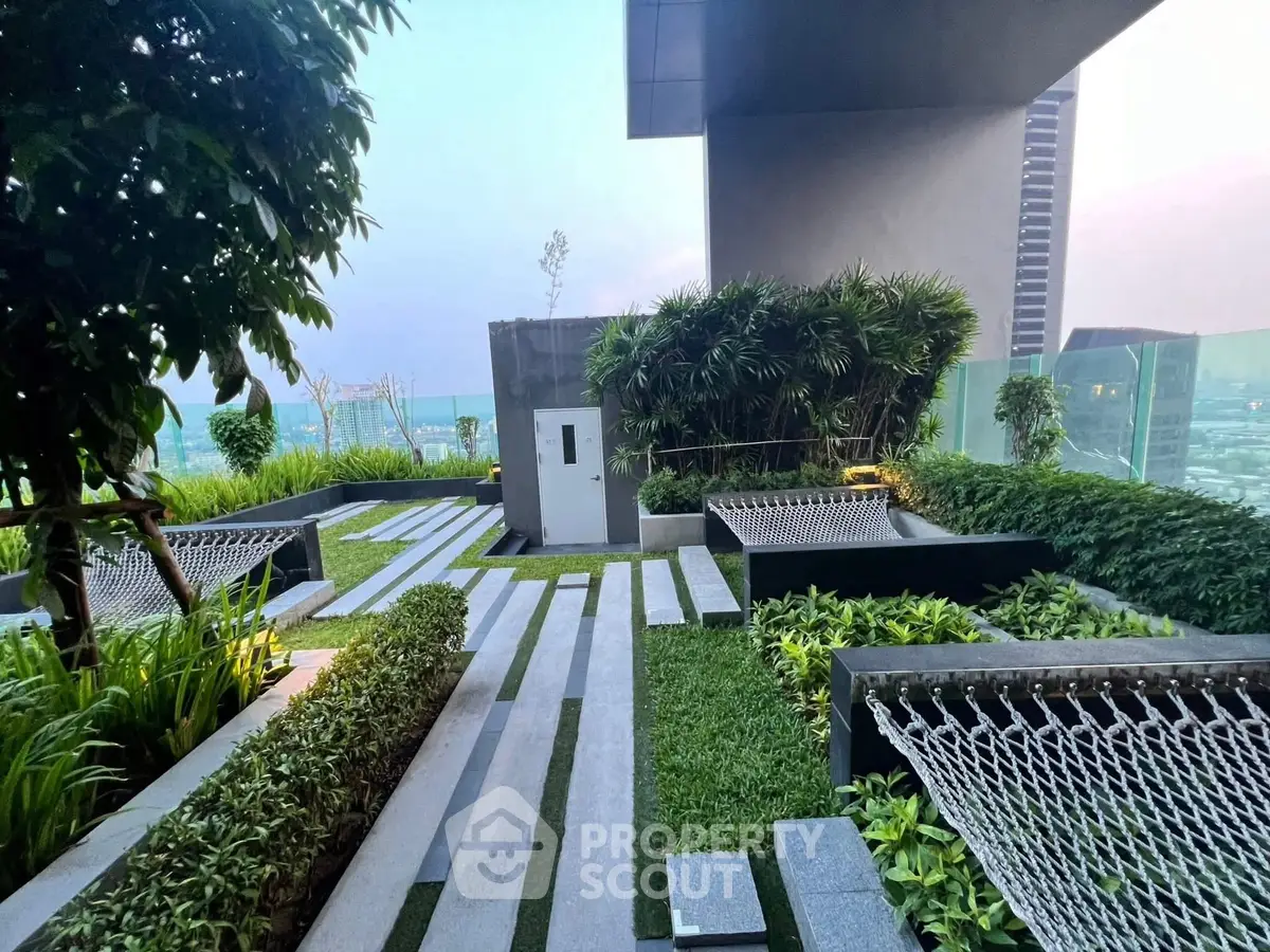 Luxurious rooftop garden with modern design and stunning city views, perfect for relaxation and leisure.