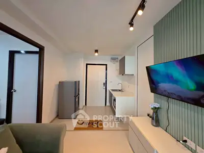 Modern living room with open kitchen and stylish decor