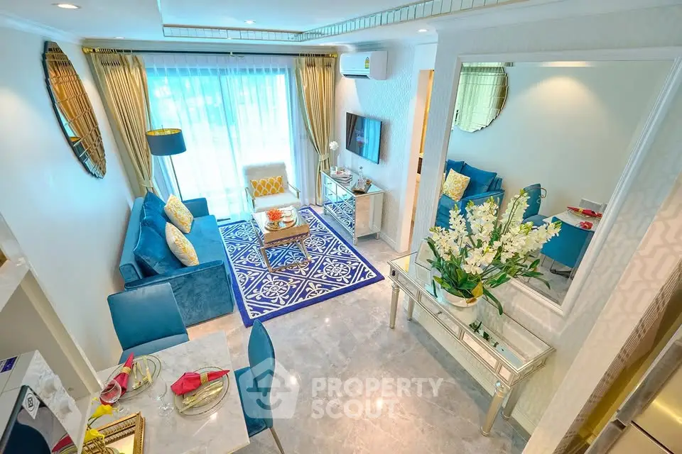 Luxurious living room with elegant decor and vibrant blue accents