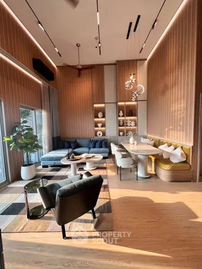 Luxurious modern living room with high ceilings and elegant decor
