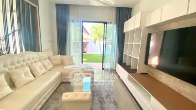 Luxurious living room with modern decor and garden view