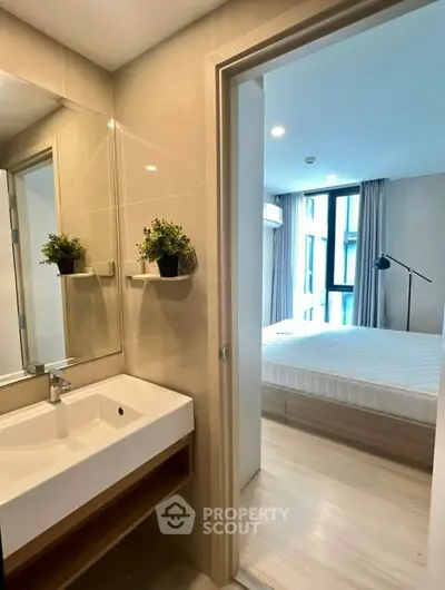 Modern apartment interior with bathroom and bedroom view